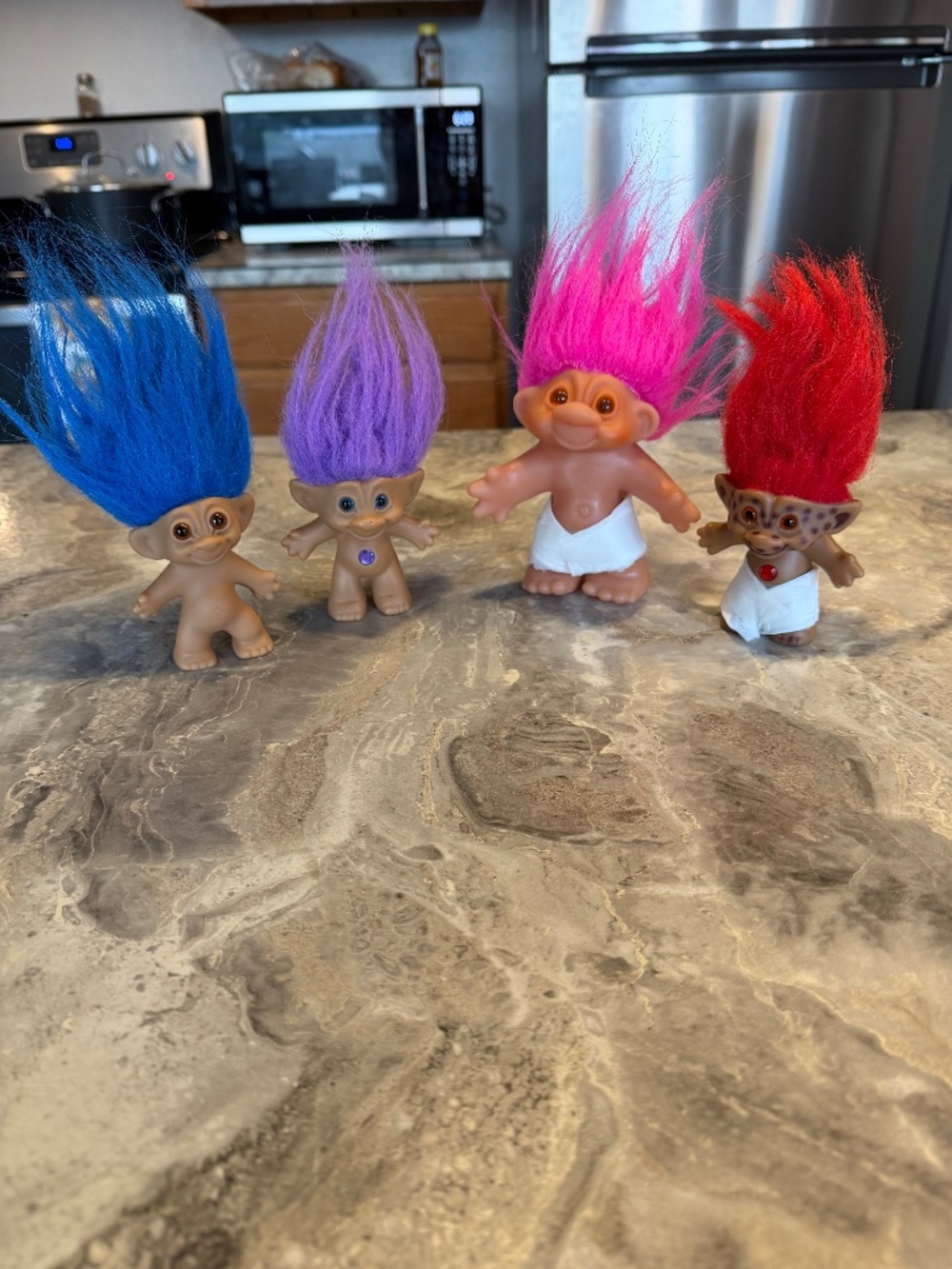Four Troll Dolls